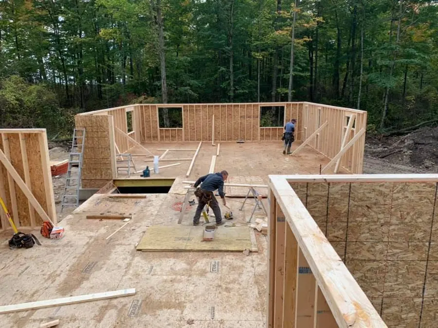 CKThompson crew framing a floor deck on a new build site