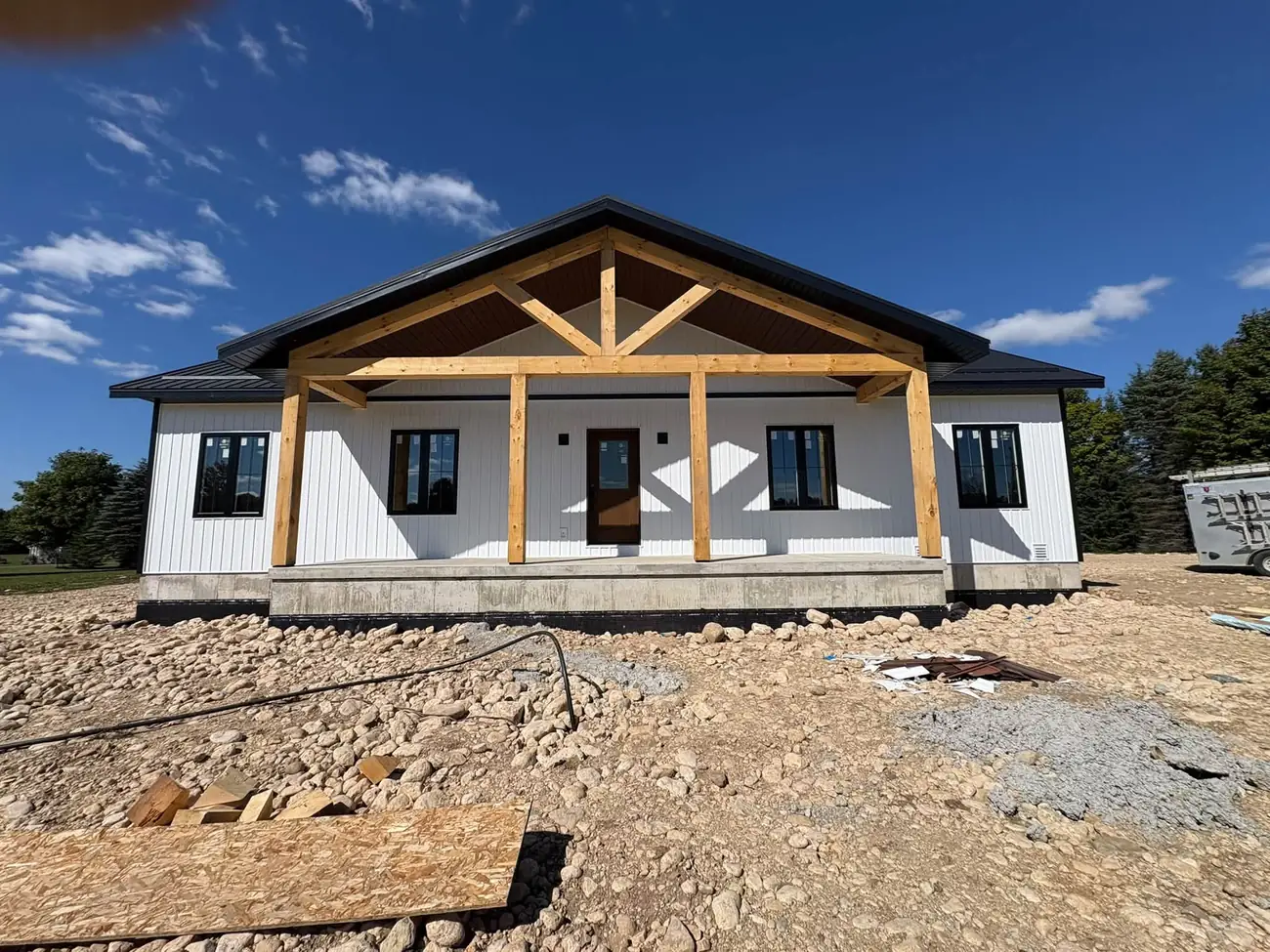 Custom bungalow with timber frame porch built by CKThompson Contracting