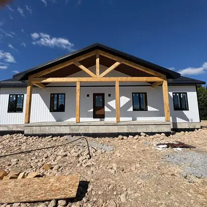 Custom bungalow with timber porch closed in