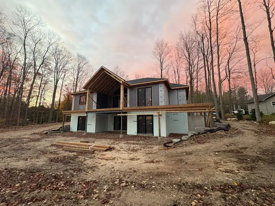 Custom home, sunset close in