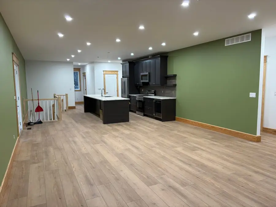 Finished open concept kitchen and living space