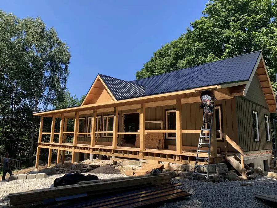 Timber framed wrap around porch under construction