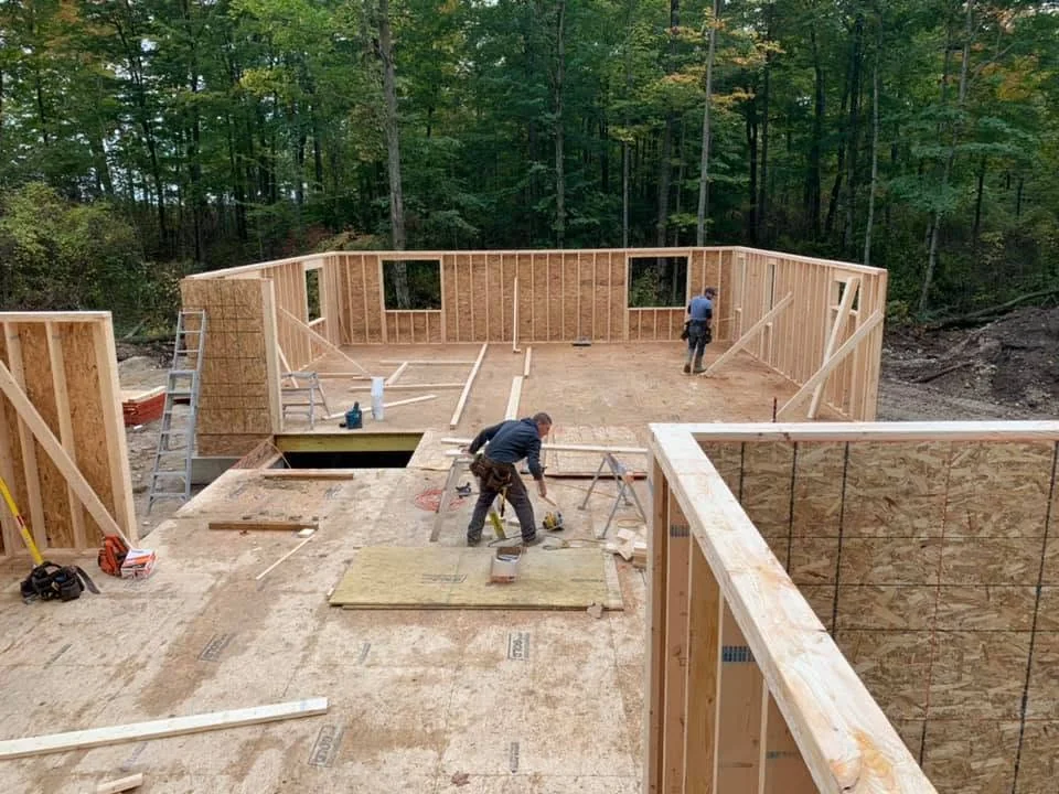 CKThompson crew framing a floor deck on a new build site